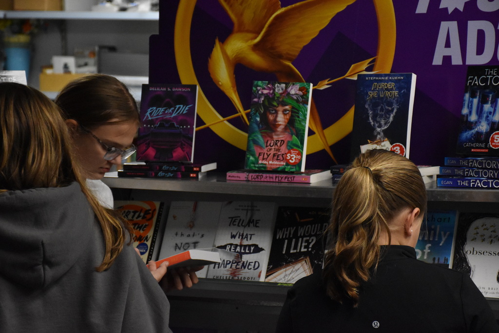 Attica Middle School students are pictured exploring the Scholastic Book Fair last week. 