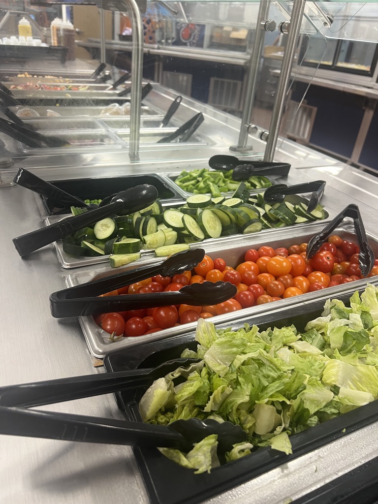 Jill Pierce’s students are pictured harvesting and distributing vegetables for our food service program. 