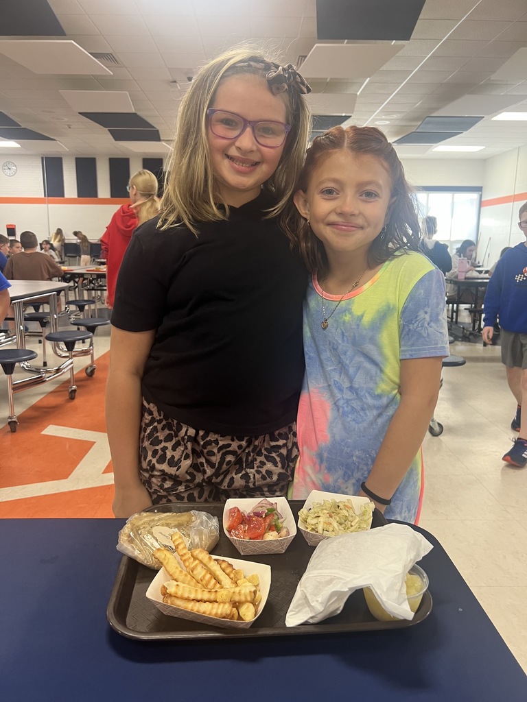 Jill Pierce’s students are pictured harvesting and distributing vegetables for our food service program. 