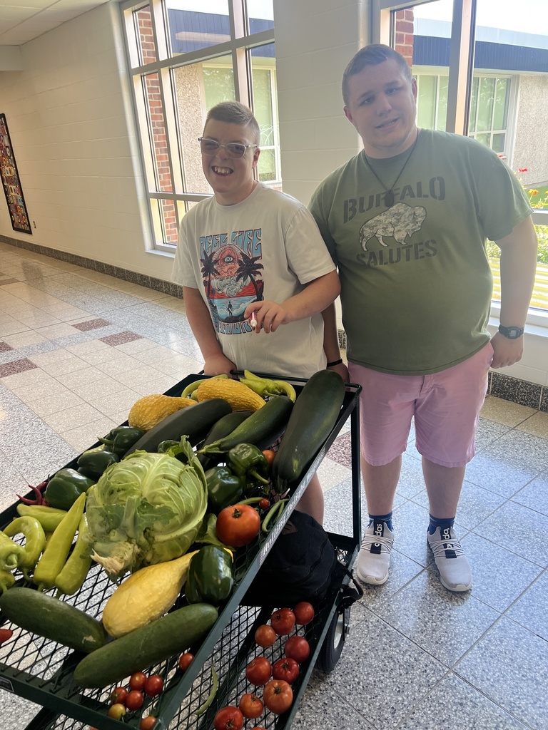 Jill Pierce’s students are pictured harvesting and distributing vegetables for our food service program. 