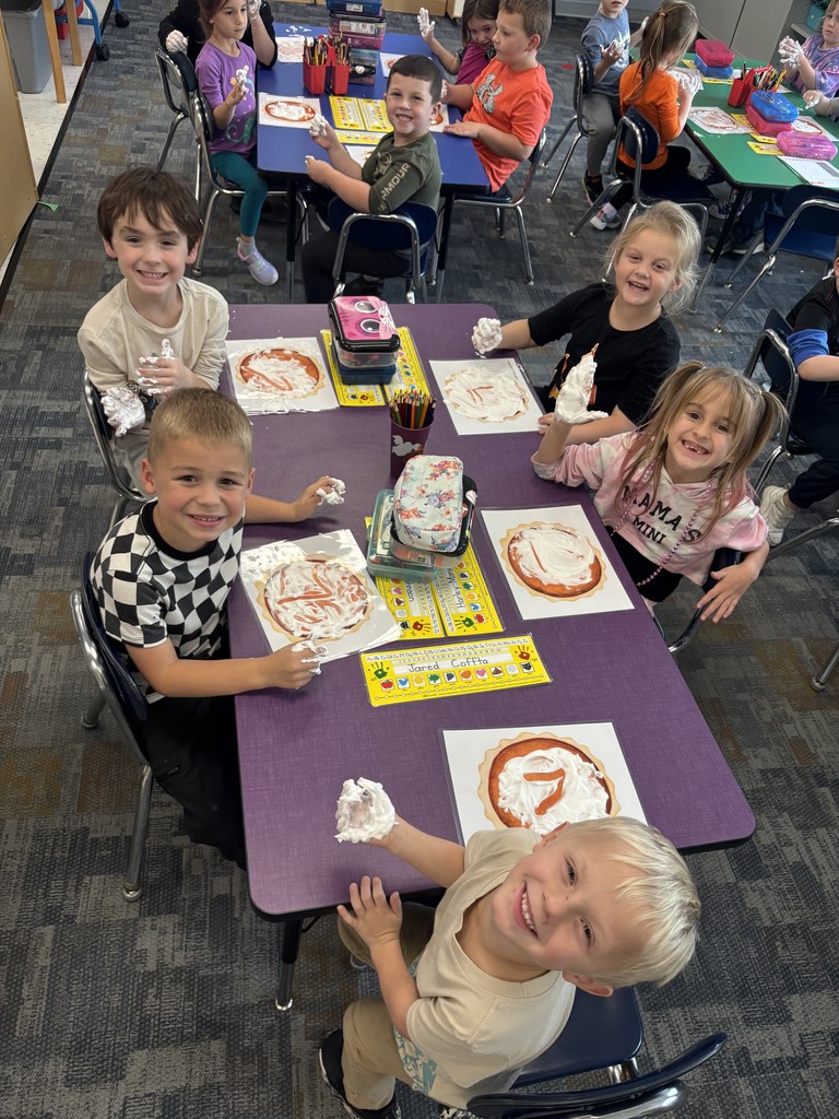 Kristin Janes’ kindergarten students are pictured practicing writing numbers in shaving cream.