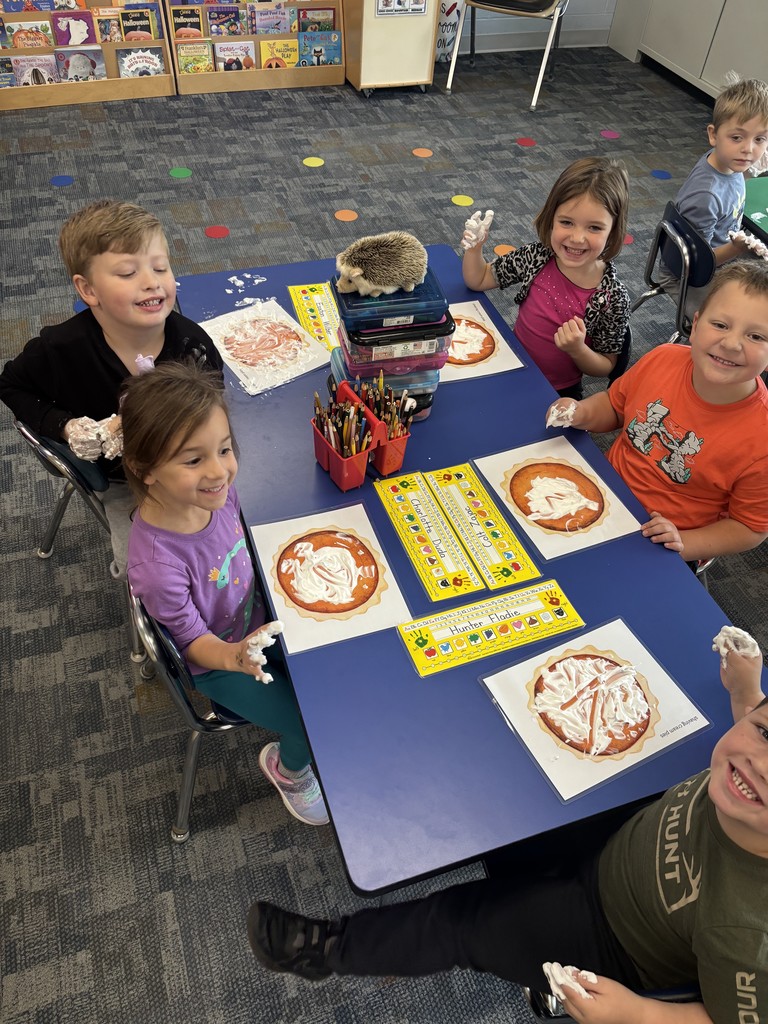 Kristin Janes’ kindergarten students are pictured practicing writing numbers in shaving cream.