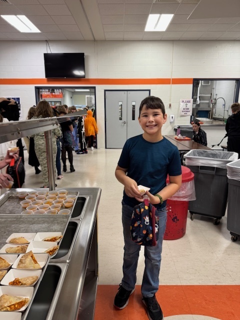 Scenes from Friday's cheese calzone taste test. 