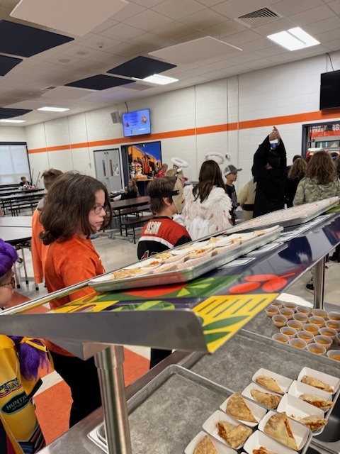 Scenes from Friday's cheese calzone taste test. 