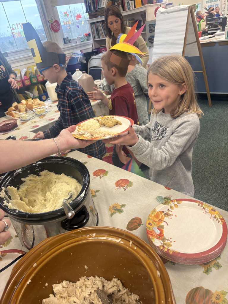 Scenes from Mrs. Cheryl Allein, Mrs. Deb Weber and Ms. Kamie Clark’s 3rd graders and Ms. Alyssa Allein’s first graders’ Thanksgiving feast on Tuesday.