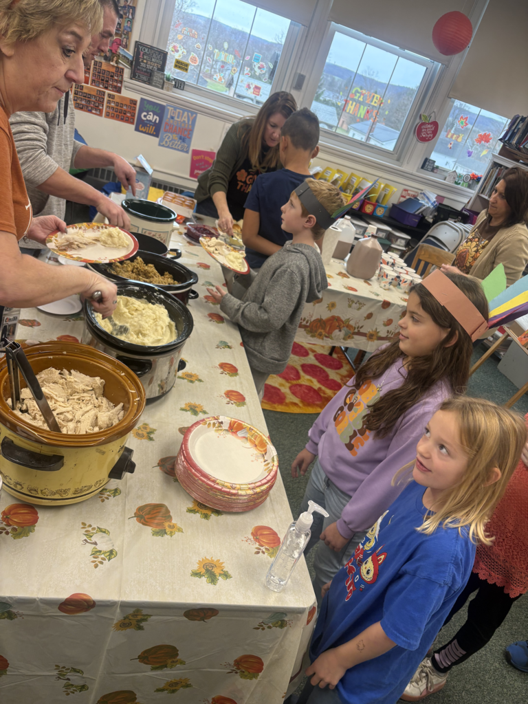 Scenes from Mrs. Cheryl Allein, Mrs. Deb Weber and Ms. Kamie Clark’s 3rd graders and Ms. Alyssa Allein’s first graders’ Thanksgiving feast on Tuesday.