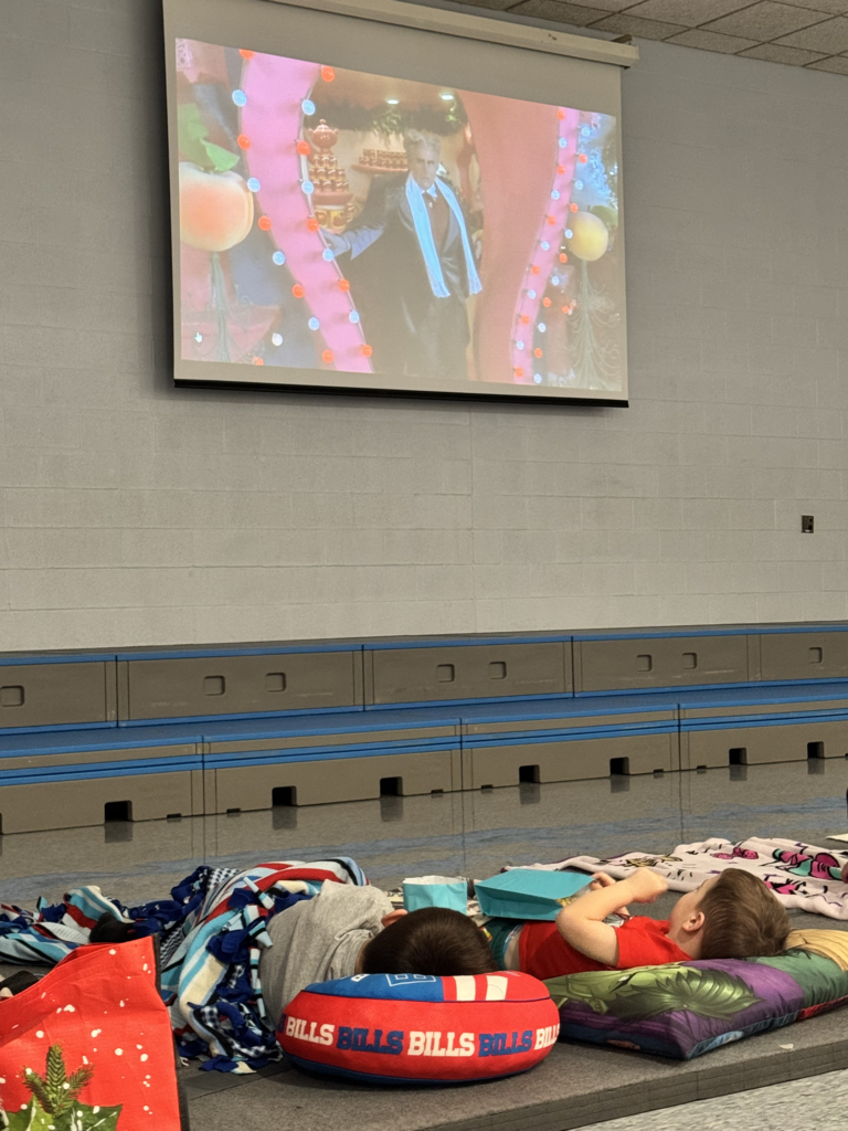 Scenes from the High School Book Club’s Community Movie Night Wednesday at Attica Elementary School.
