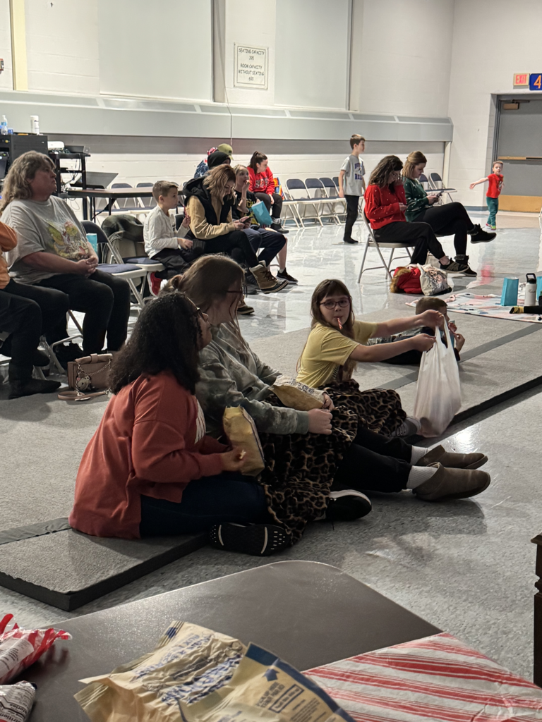 Scenes from the High School Book Club’s Community Movie Night Wednesday at Attica Elementary School.