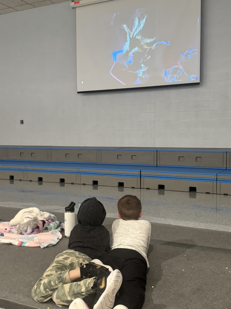 Scenes from the High School Book Club’s Community Movie Night Wednesday at Attica Elementary School.