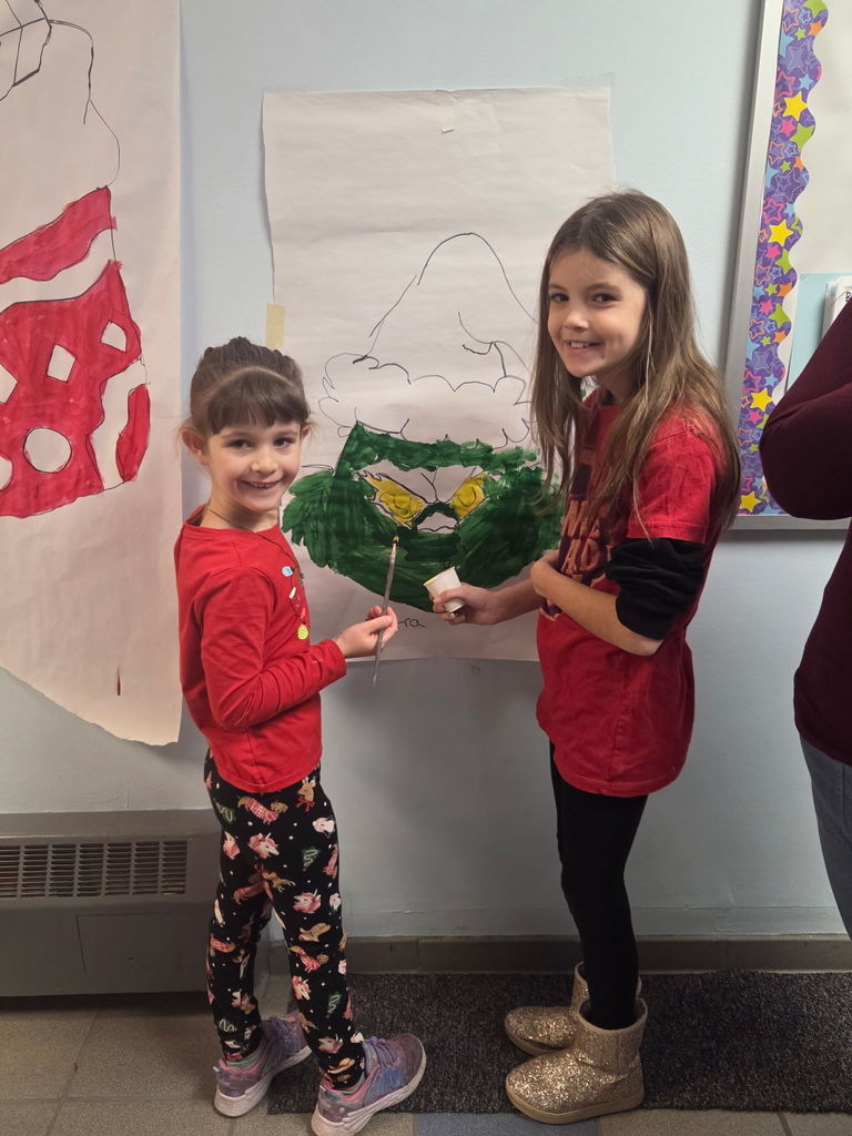Scenes from third graders’ hallway decorating last week at Attica Elementary. 