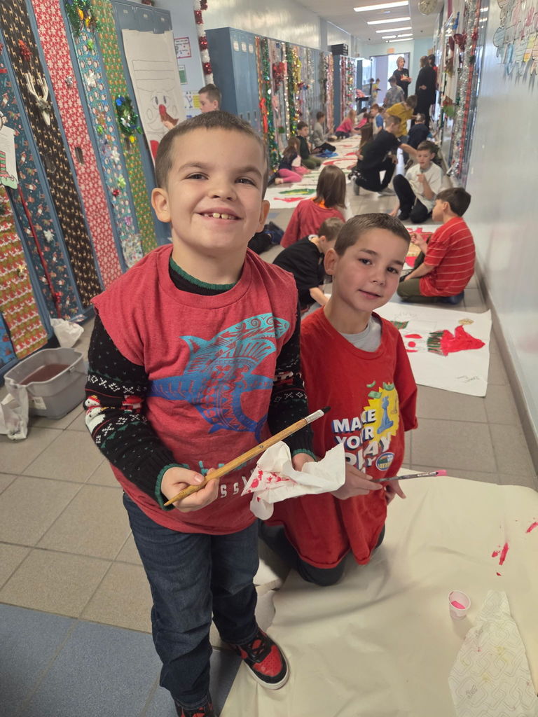 Scenes from third graders’ hallway decorating last week at Attica Elementary. 