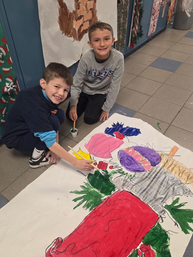 Scenes from third graders’ hallway decorating last week at Attica Elementary. 