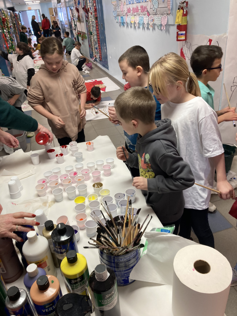 Scenes from third graders’ hallway decorating last week at Attica Elementary. 