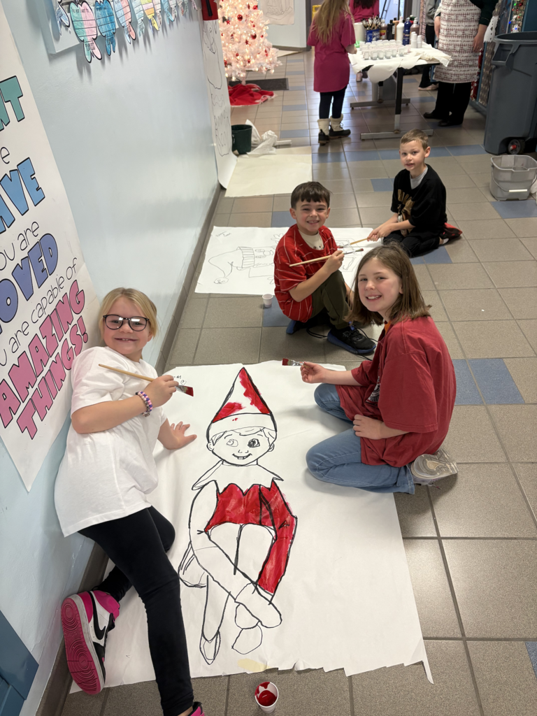 Scenes from third graders’ hallway decorating last week at Attica Elementary. 