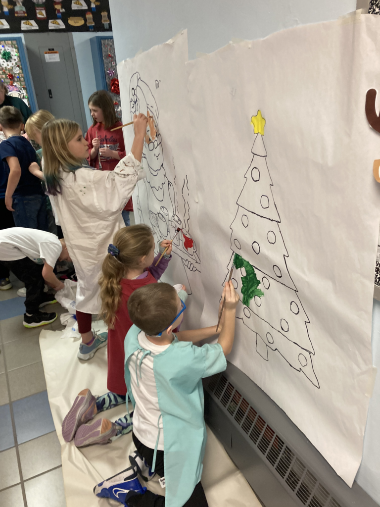 Scenes from third graders’ hallway decorating last week at Attica Elementary. 