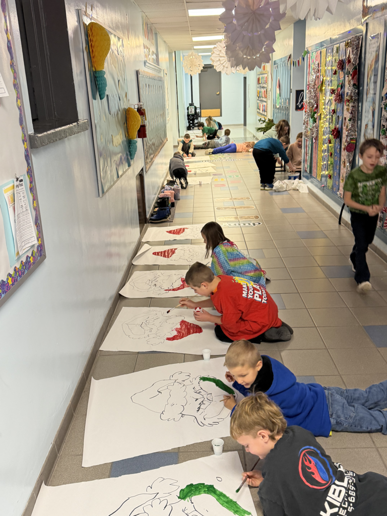 Scenes from third graders’ hallway decorating last week at Attica Elementary. 
