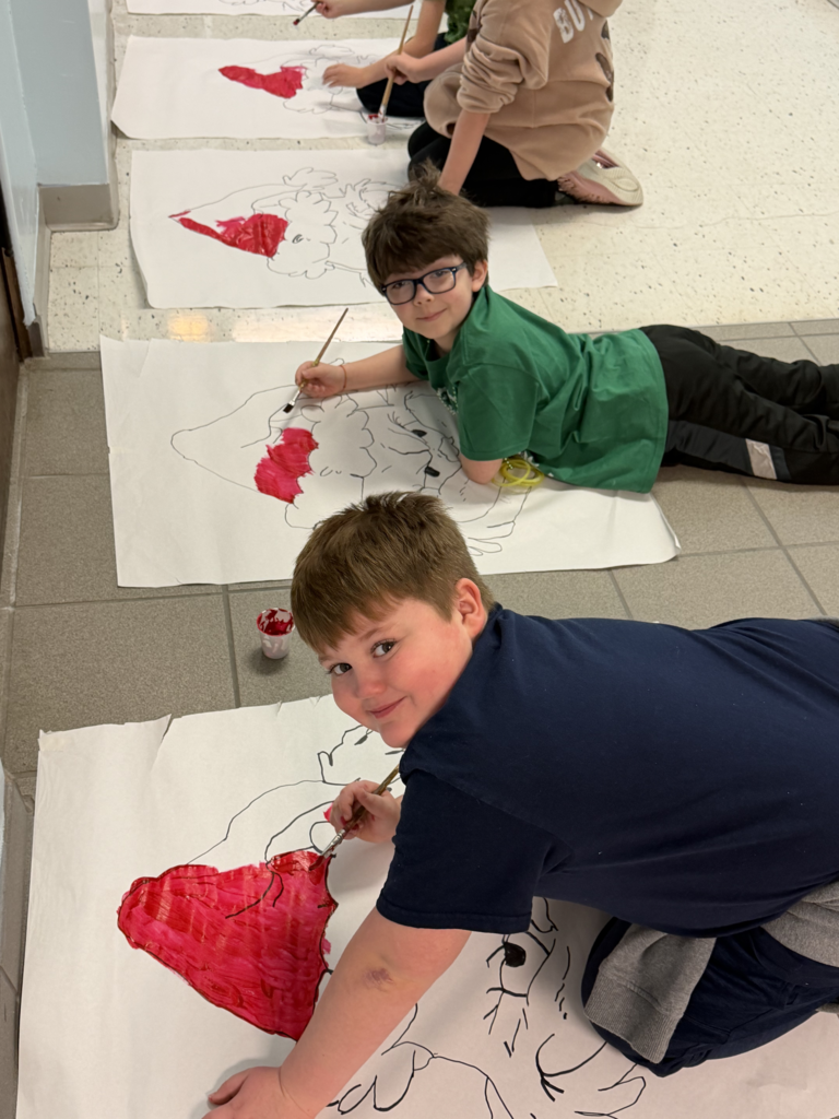 Scenes from third graders’ hallway decorating last week at Attica Elementary. 