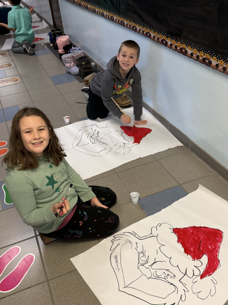 Scenes from third graders’ hallway decorating last week at Attica Elementary. 