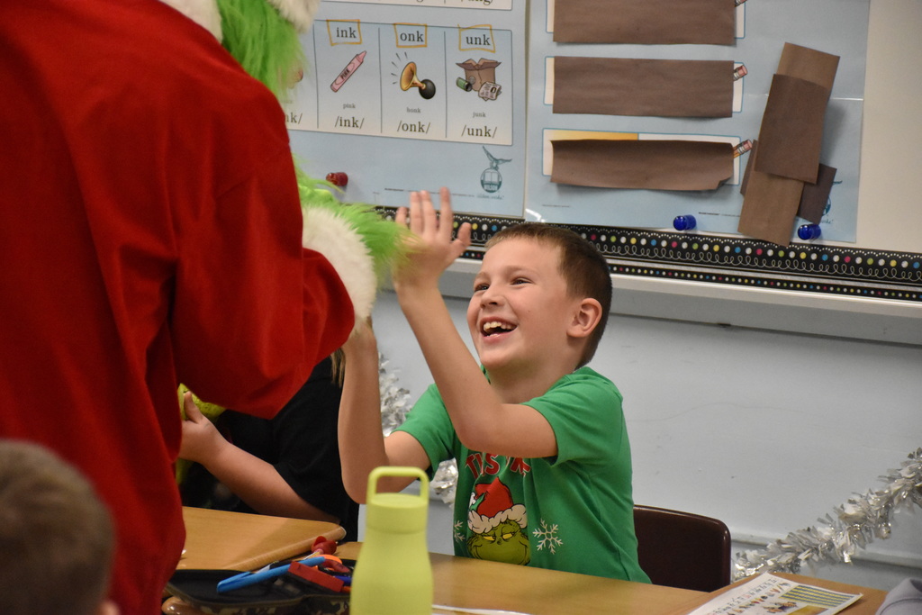 Scenes from Grinch Day at Attica Elementary School Wednesday morning. 