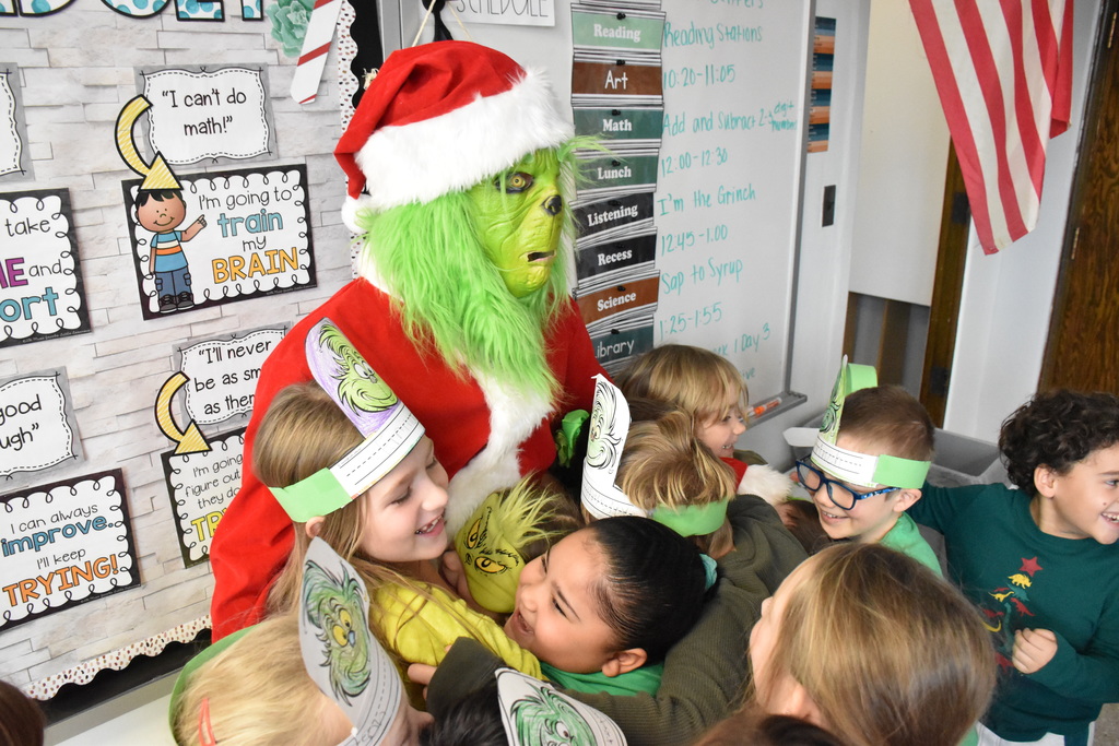 Scenes from Grinch Day at Attica Elementary School Wednesday morning. 