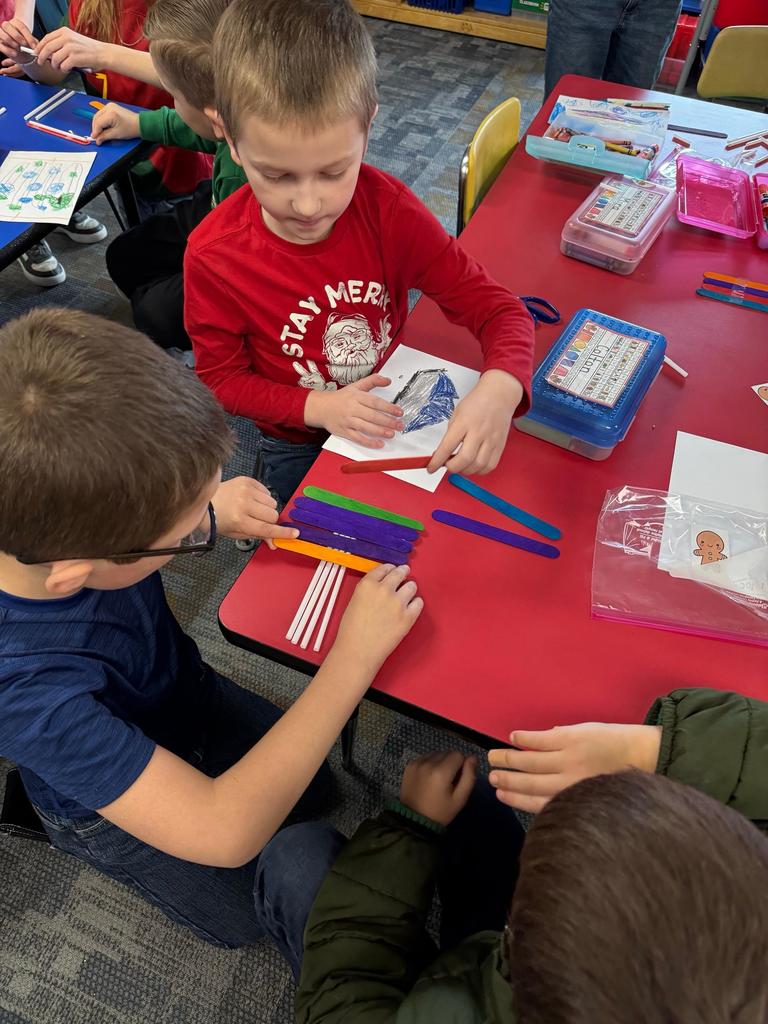 Scenes from our kindergarten-3rd grade buddies’ gingerbread man boat activity earlier this week. 