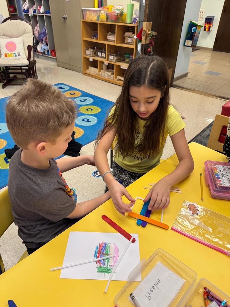 Scenes from our kindergarten-3rd grade buddies’ gingerbread man boat activity earlier this week. 