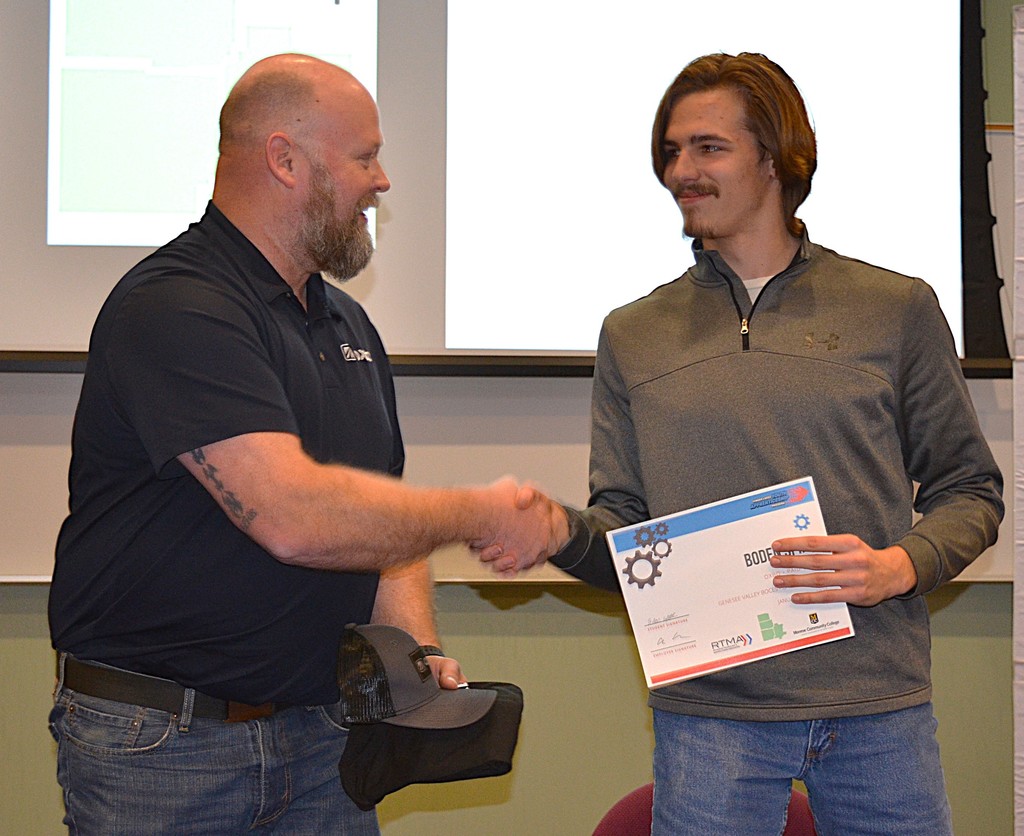 Scenes from the Finger Lakes Youth Apprenticeship Program’s annual signing day at Genesee Community College Jan. 28. 