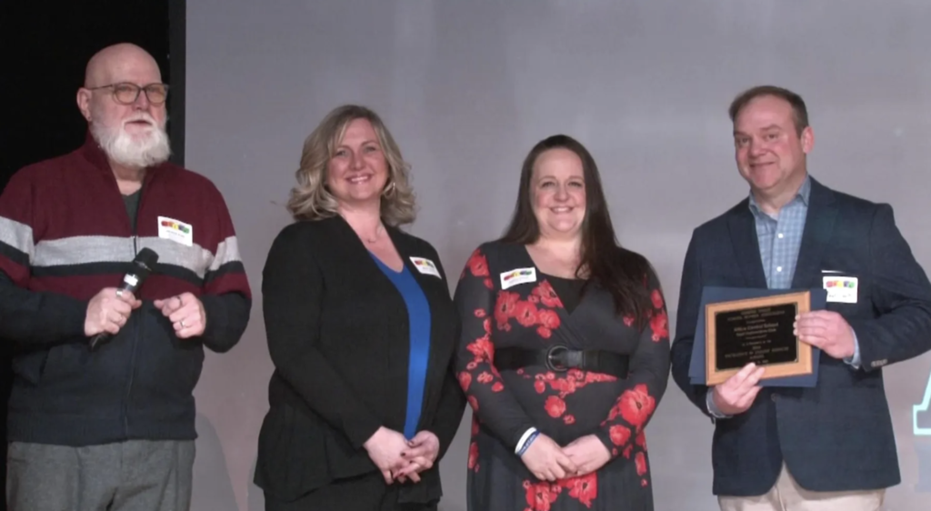 Becky Sphar, Jenelle Bauer and Paul Clark accept the Genesee Valley School Boards Association’s Excellence in Student Services Award Jan. 24 at Letchworth Central Schools. 