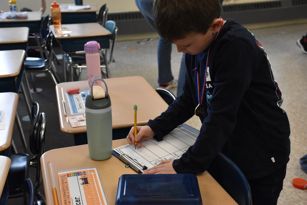 Scenes from the Measurement Olympics at Attica Elementary School Feb. 12. 