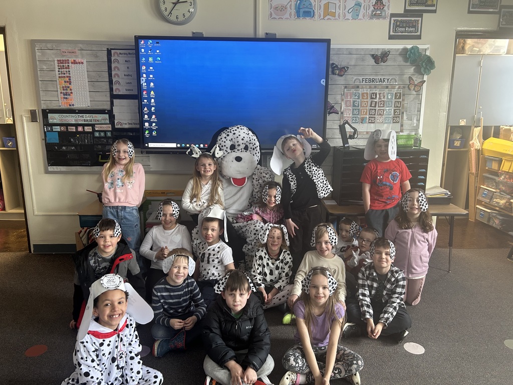 First graders are pictured celebrating the 101st day of school on Tuesday by dressing up as dalmatians.
