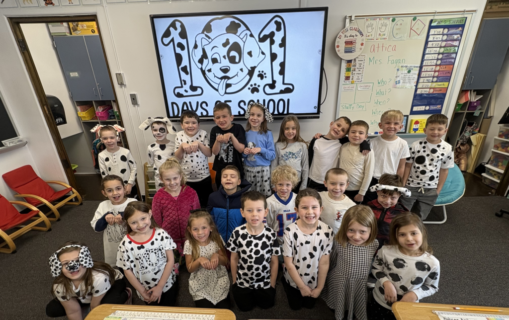 First graders are pictured celebrating the 101st day of school on Tuesday by dressing up as dalmatians.