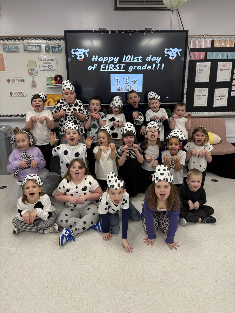 First graders are pictured celebrating the 101st day of school on Tuesday by dressing up as dalmatians.