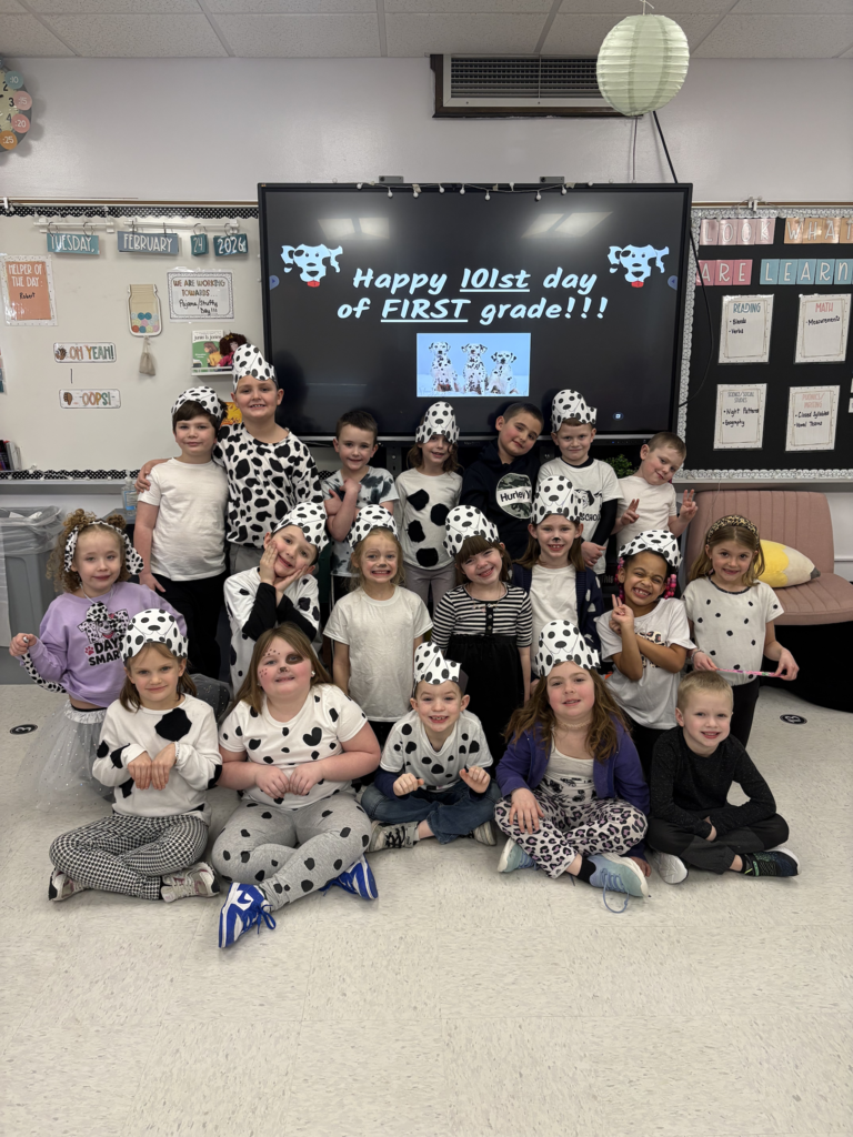 First graders are pictured celebrating the 101st day of school on Tuesday by dressing up as dalmatians.