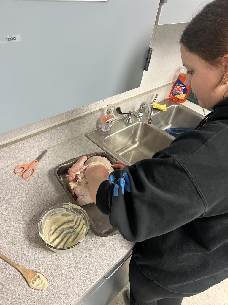 Alyssa Wright’s Intro to Agriculture students are pictured preparing two chicken dishes in class.