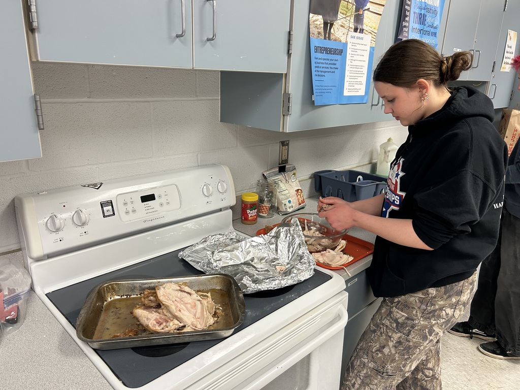 Alyssa Wright’s Intro to Agriculture students are pictured preparing two chicken dishes in class.