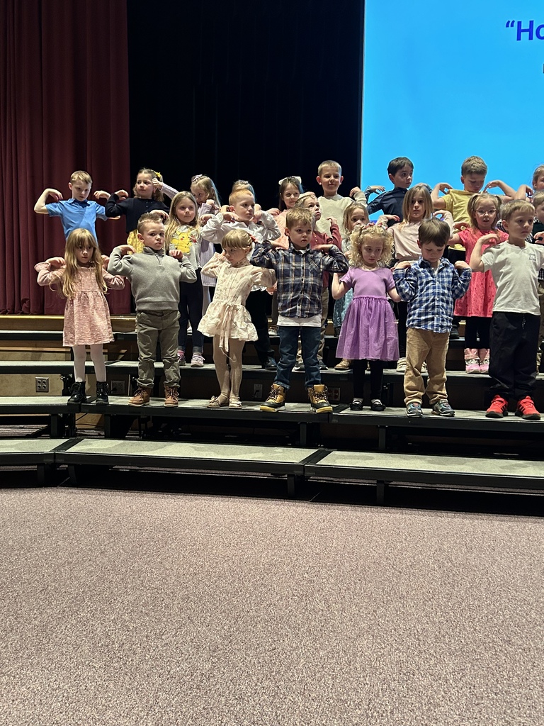 Scenes from our Kindergarten Rhythm Band concert March 20.