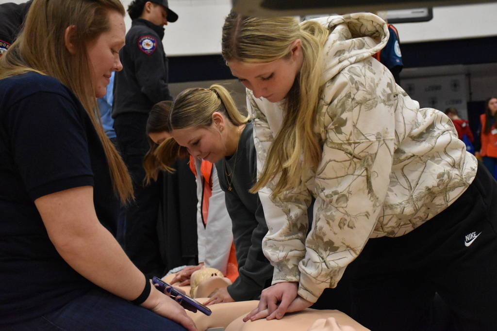 Scenes from the ‘GLOW With Your Hands: Healthcare’ career expo at Genesee Community College March 20. 