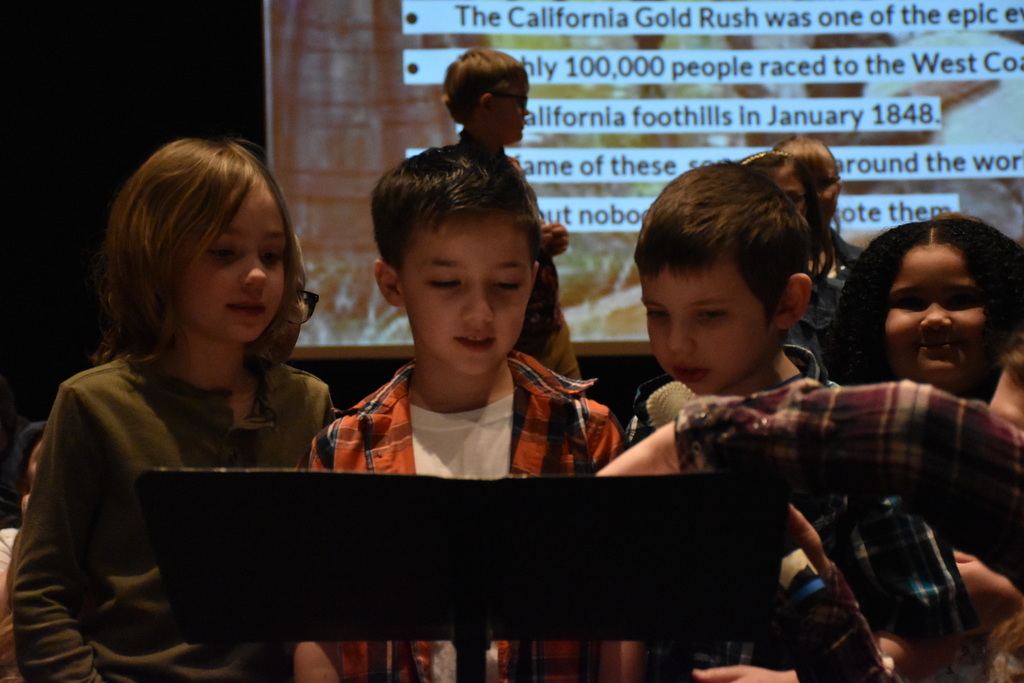 Scenes from our second graders’ folk music concert Thursday, March 26. 