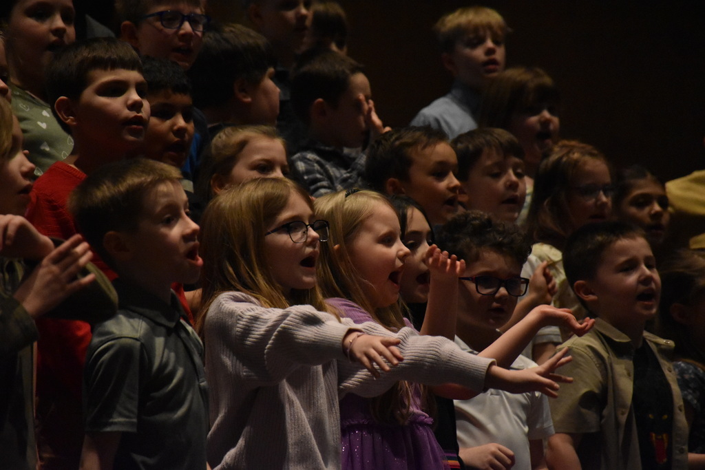 Scenes from our second graders’ folk music concert Thursday, March 26. 