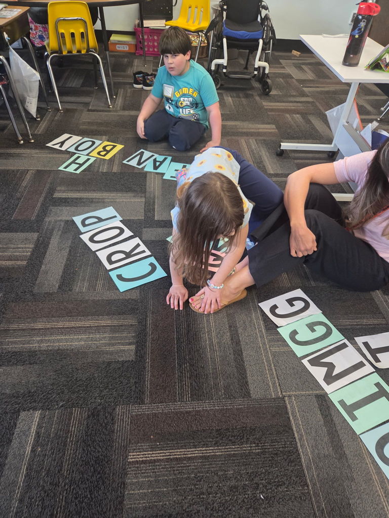 Scenes from Mrs. Lindsey Gephart’s students’ game of giant Scrabble earlier this week. 