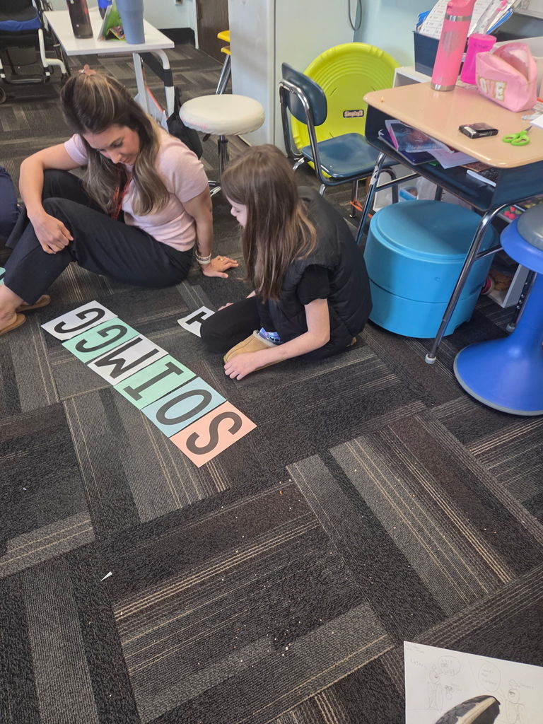 Scenes from Mrs. Lindsey Gephart’s students’ game of giant Scrabble earlier this week. 