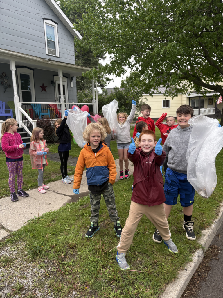 Scenes from Ms. Lauren Kocher’s third grade class’s and Mrs. Dylah Fagan’s first grade class’s service project clean up. 