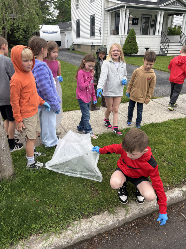 Scenes from Ms. Lauren Kocher’s third grade class’s and Mrs. Dylah Fagan’s first grade class’s service project clean up. 