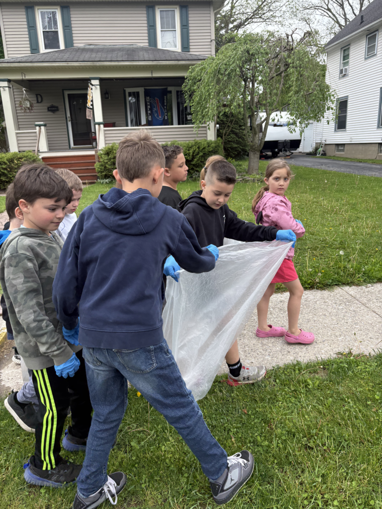 Scenes from Ms. Lauren Kocher’s third grade class’s and Mrs. Dylah Fagan’s first grade class’s service project clean up. 