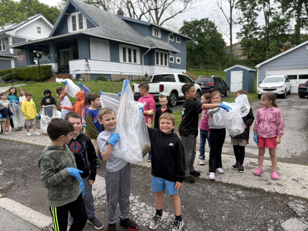 Scenes from Ms. Lauren Kocher’s third grade class’s and Mrs. Dylah Fagan’s first grade class’s service project clean up. 