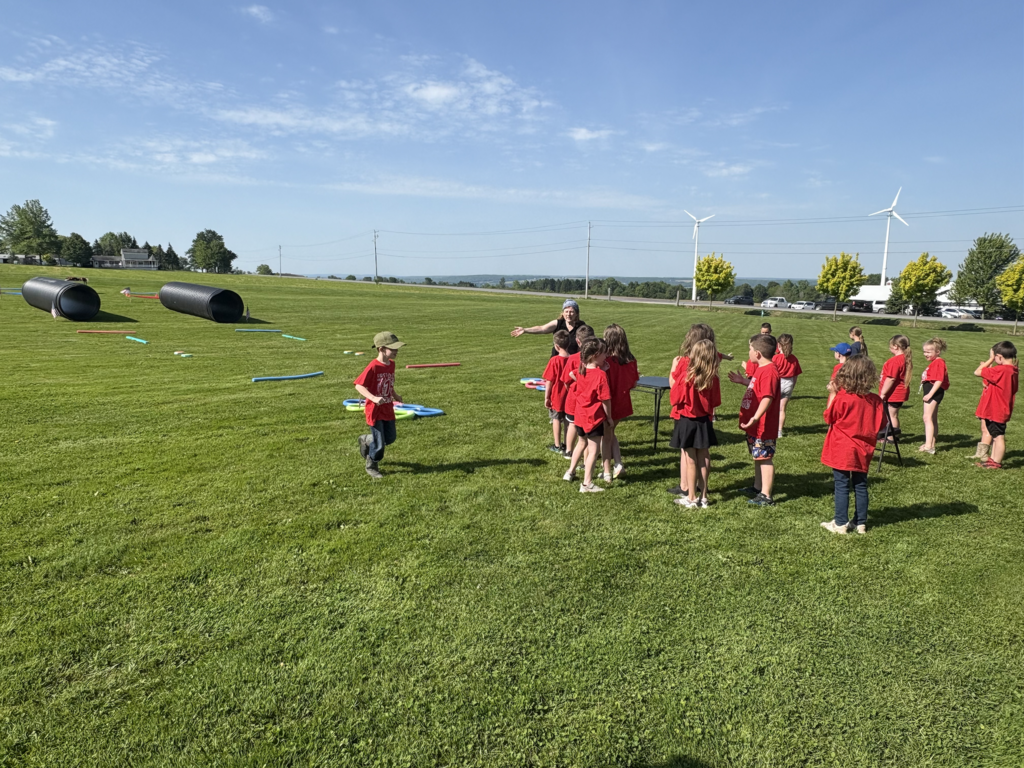 Scenes from first graders' field trip to Breezyhill Dairy in Strykersville June 5. 