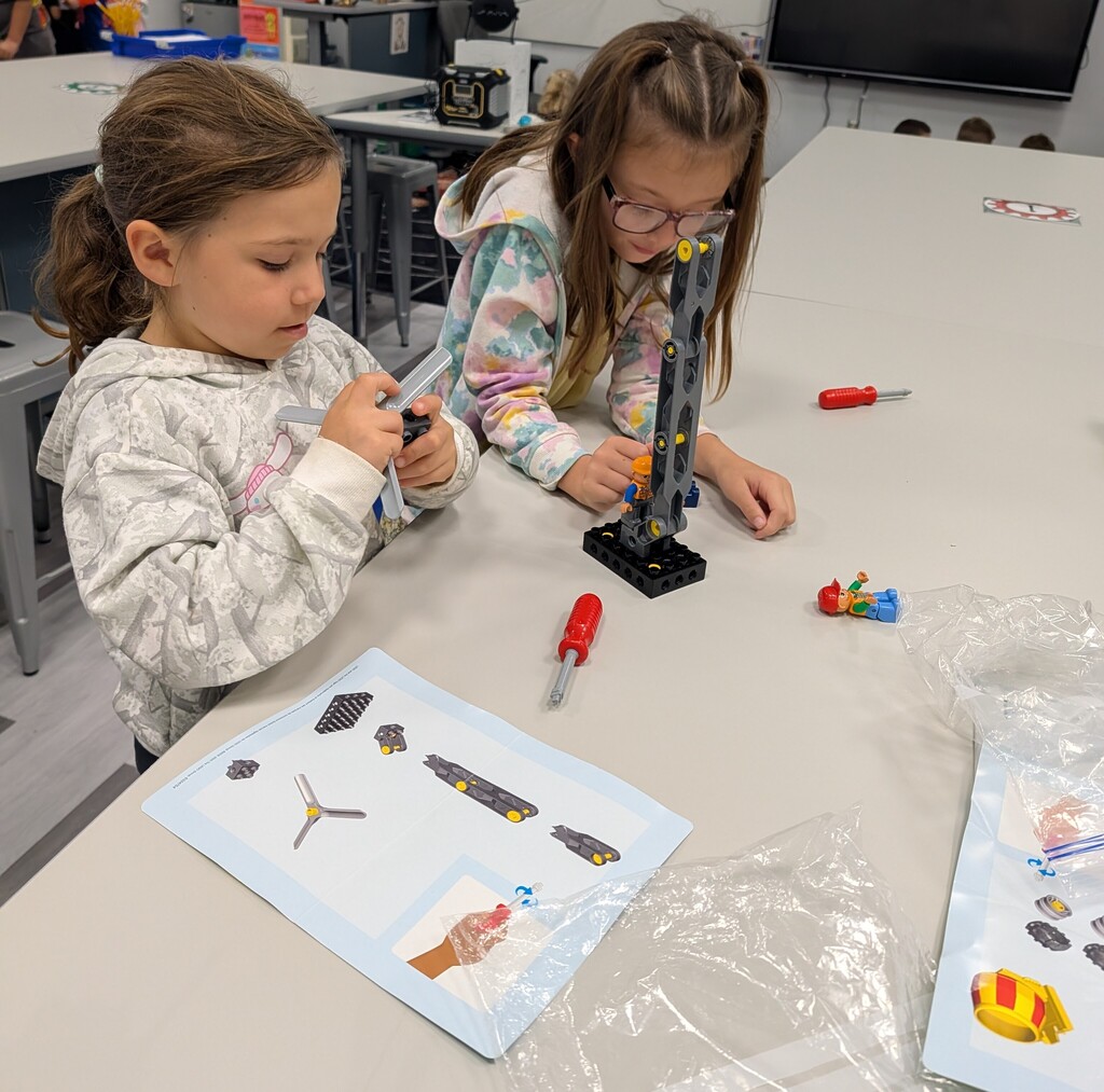 Students participating in hands-on windmill project.