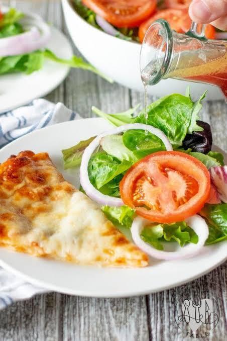 Early Release Day Lunch is Cheese Pizza w/ Salad and Sliced Apples
