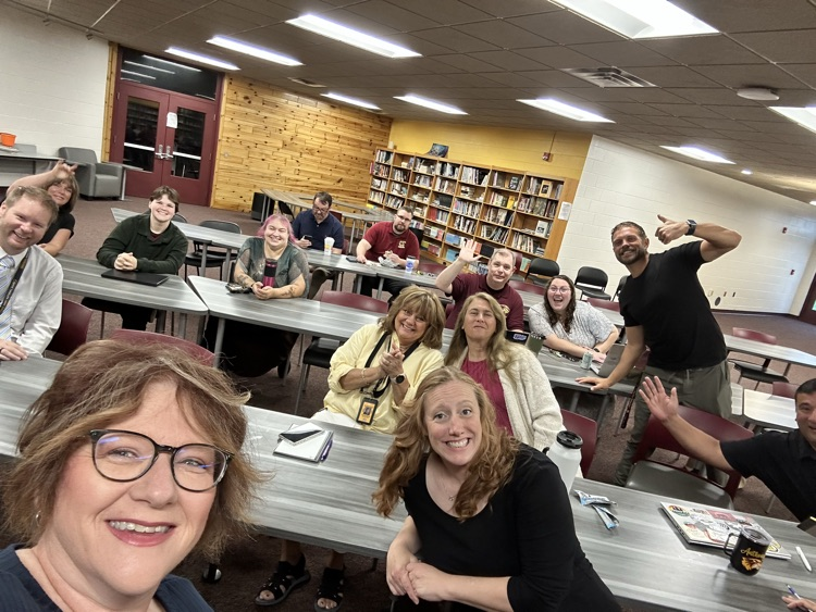 Staff gather early and have a good laugh! 