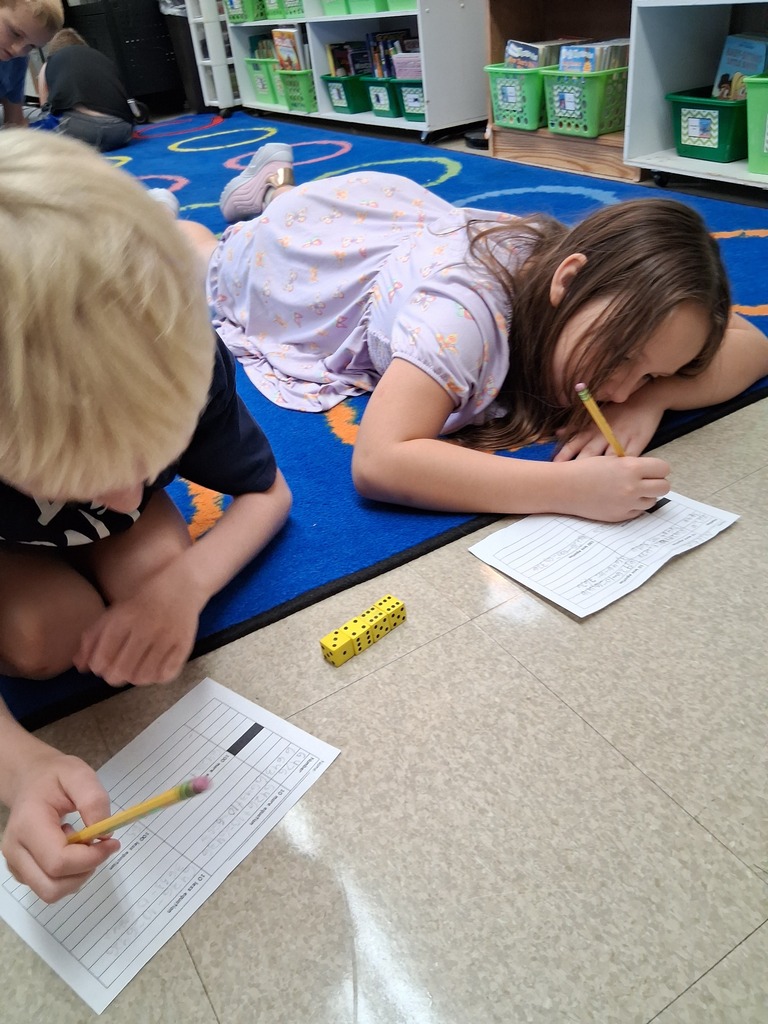 Students playing dice game 